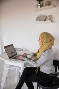 woman typing on computer